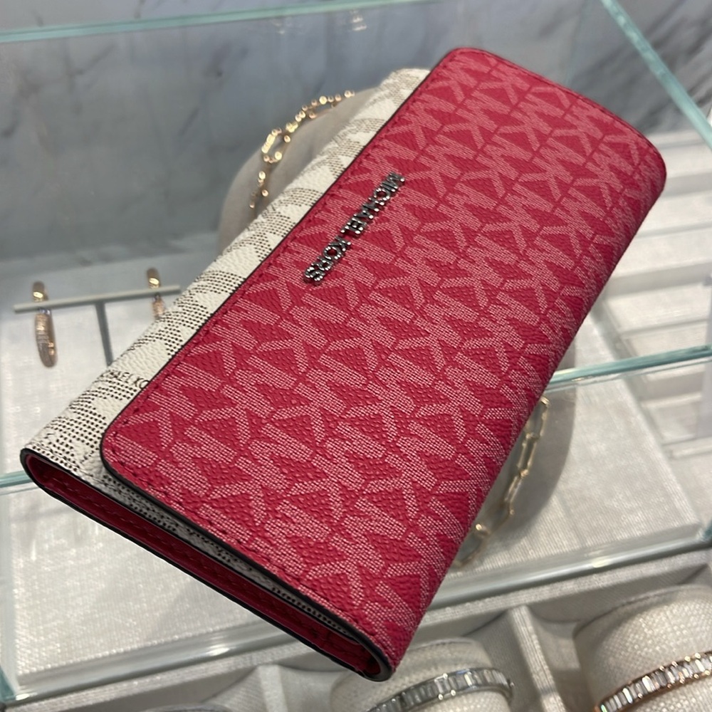 MICHAEL KORS Jet Set Travel Signature Logo Tri-Fold Wallet
DARK RASPBERRY MULTI - Picture 8 of 16
